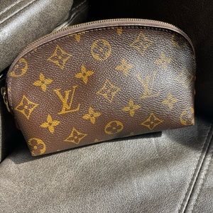 Louis Vuitton cosmetic pouch.(: